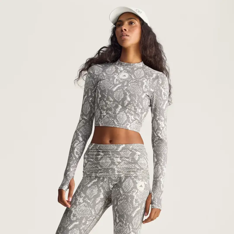 By Stella McCartney Maglietta a maniche lunghe da allenamento crop stampata Almond Milk