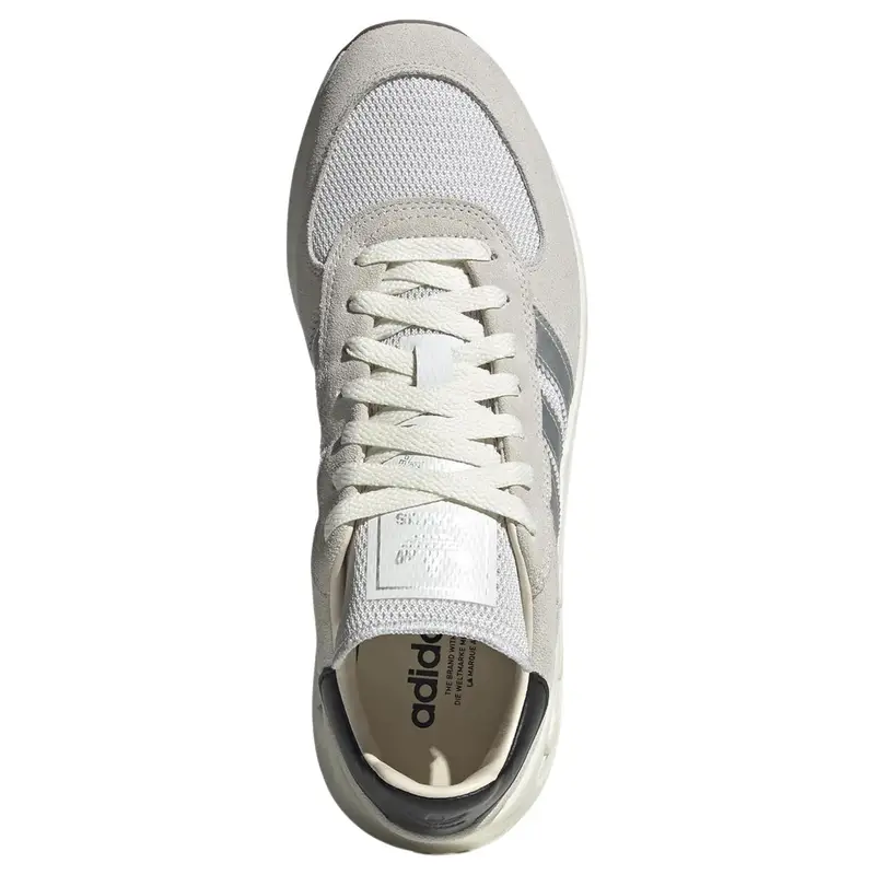 LA Trainer Lux Bianco Cristallo Argento Metallizzato Sneakers Unisex Nero Core IE6478 40 miniatura 3