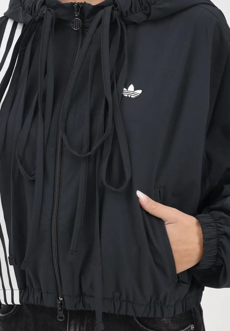 Giacca a vento Ribbon Off Placed 3 Stripes nera da donna miniatura 3