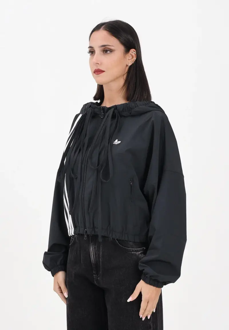 Giacca a vento Ribbon Off Placed 3 Stripes nera da donna