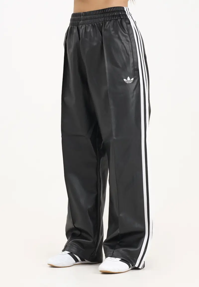 Pantalone adidas x Jeremy Scott Pride in ecopelle nera da donna