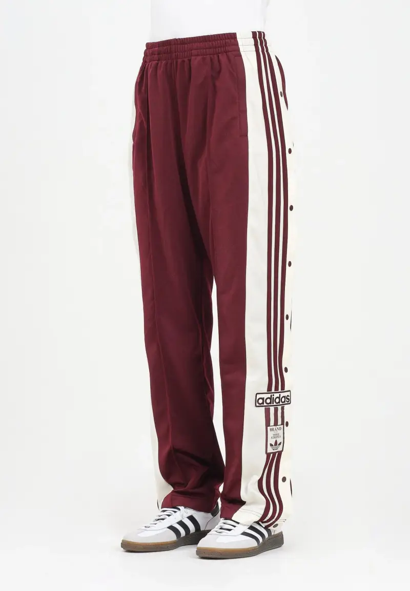 Pantalone sportivo Adibreak bordeaux da donna