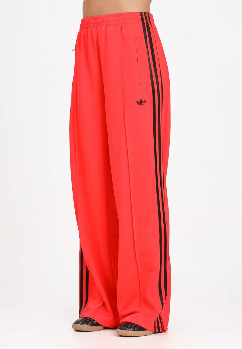 ADIDAS ORIGINALS Pantalone sportivo Adicolor Classic Firebird Loose rosso fluo da donna