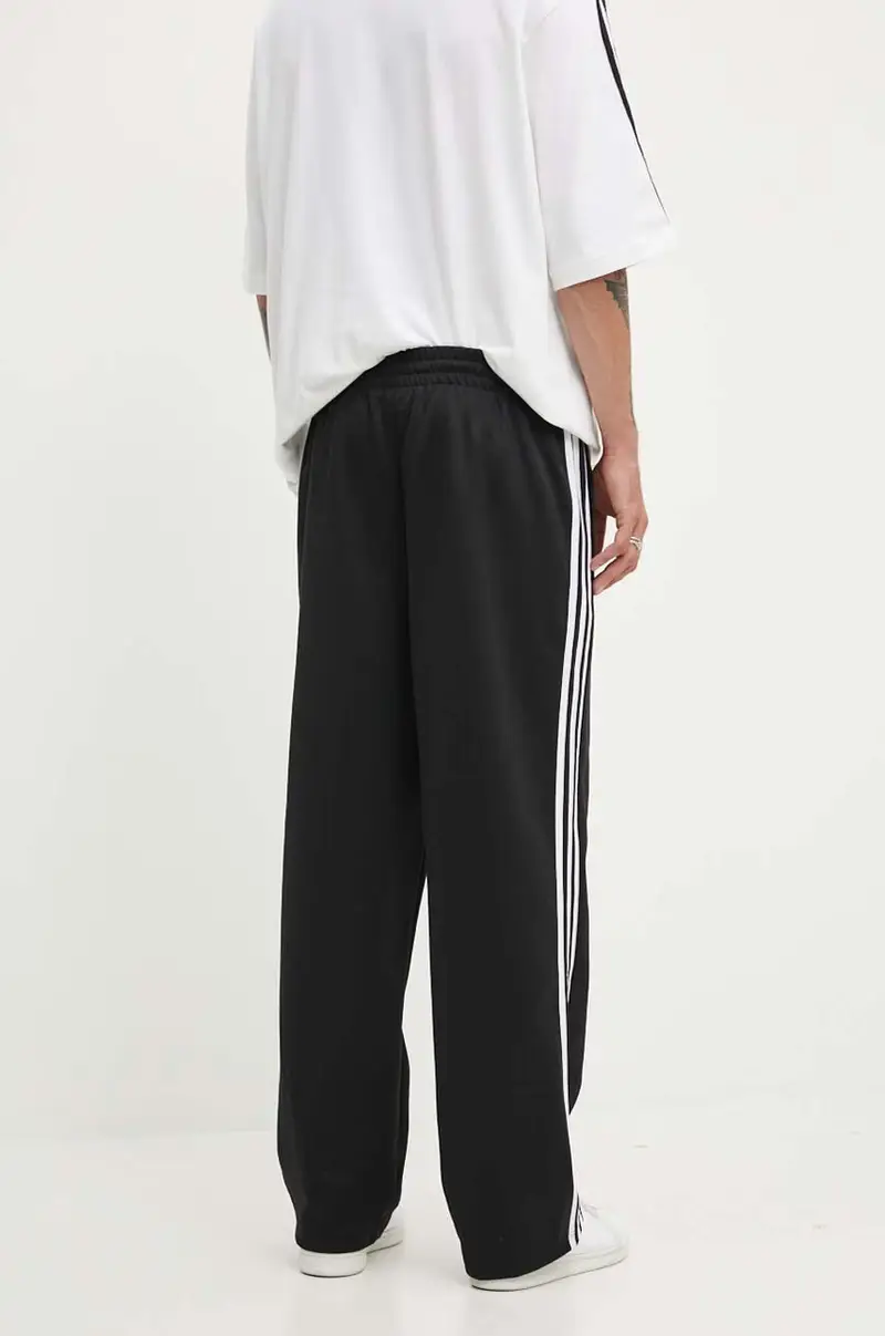 pantaloni Adicolor Baggy Fit Firebird Pant uomo colore nero IZ4801 miniatura 3