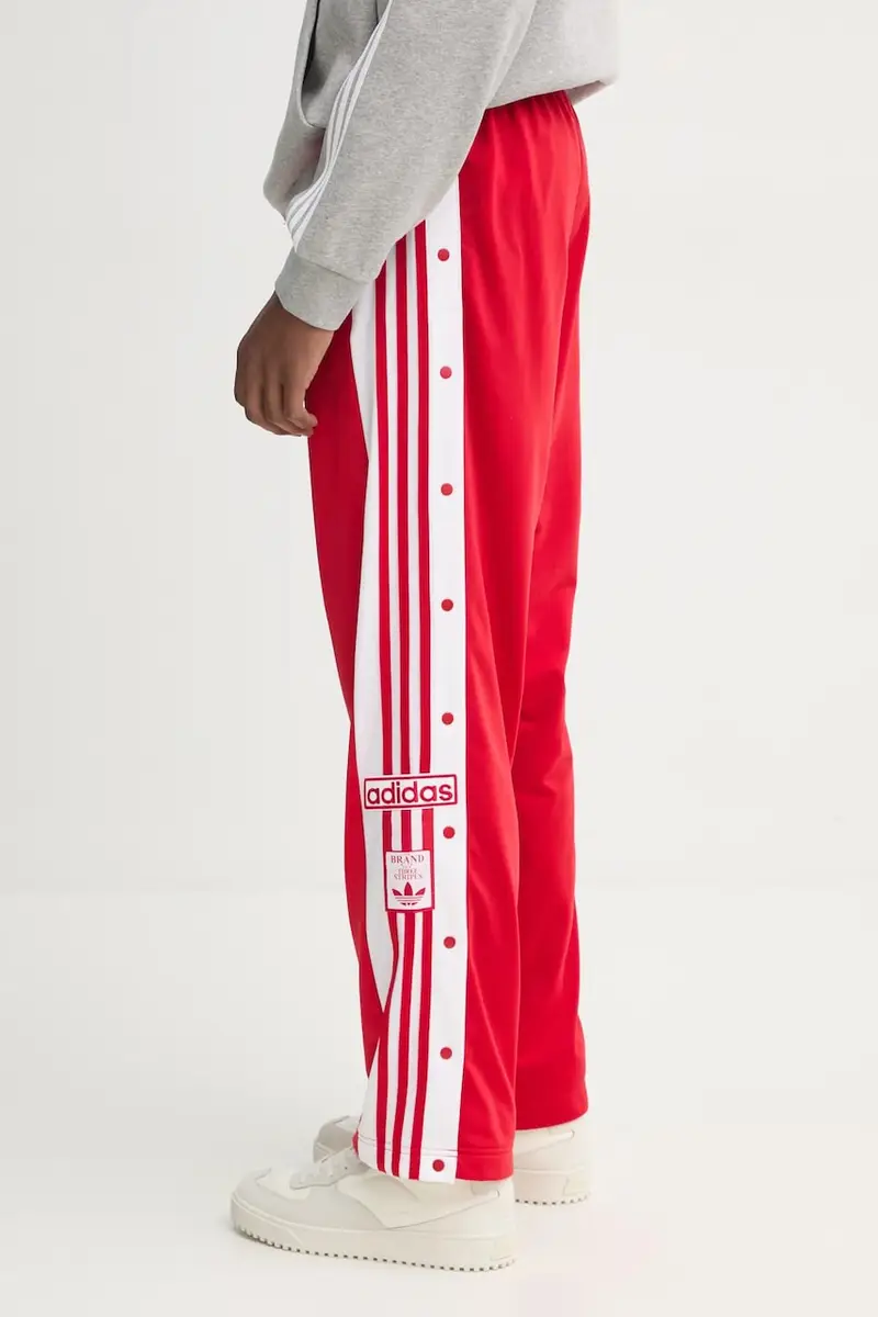 pantaloni della tuta Adibreak colore rosso con applicazione JP3765