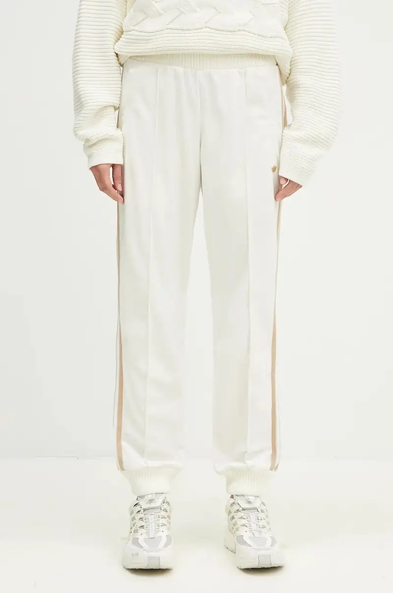 pantaloni della tuta Velvet Track Pant colore beige con applicazione IX0960