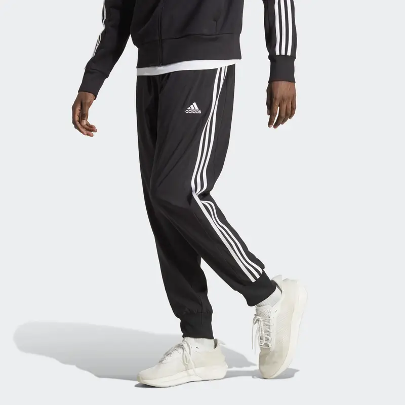 Pantaloni AEROREADY Essentials Tapered Cuff Woven 3-Stripes | Adidas Nero