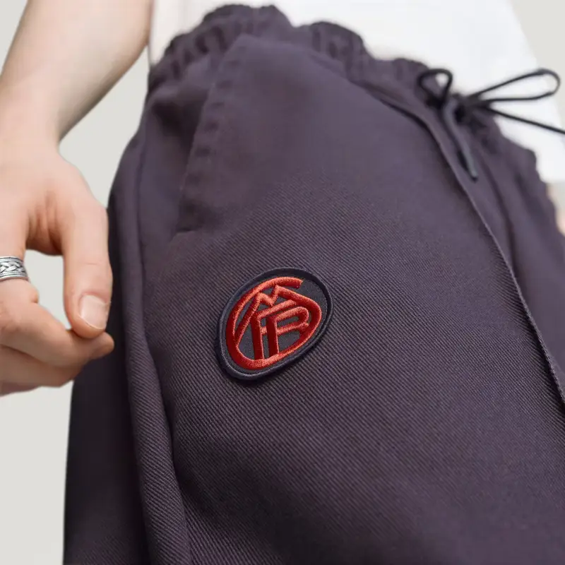 Pantaloni da allenamento FC Bayern Terrace Icons Aurora Black miniatura 3