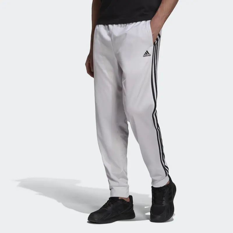 Pantaloni da allenamento Primegreen Essentials Warm-Up Tapered 3-Stripes | Adidas Bianco