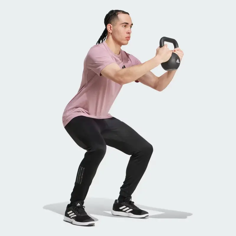 Pantaloni da allenamento Train Essentials Camo Black miniatura 3