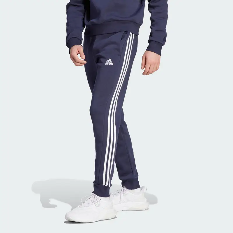Pantaloni Essentials Fleece 3-Stripes Tapered Cuff | Adidas Nero