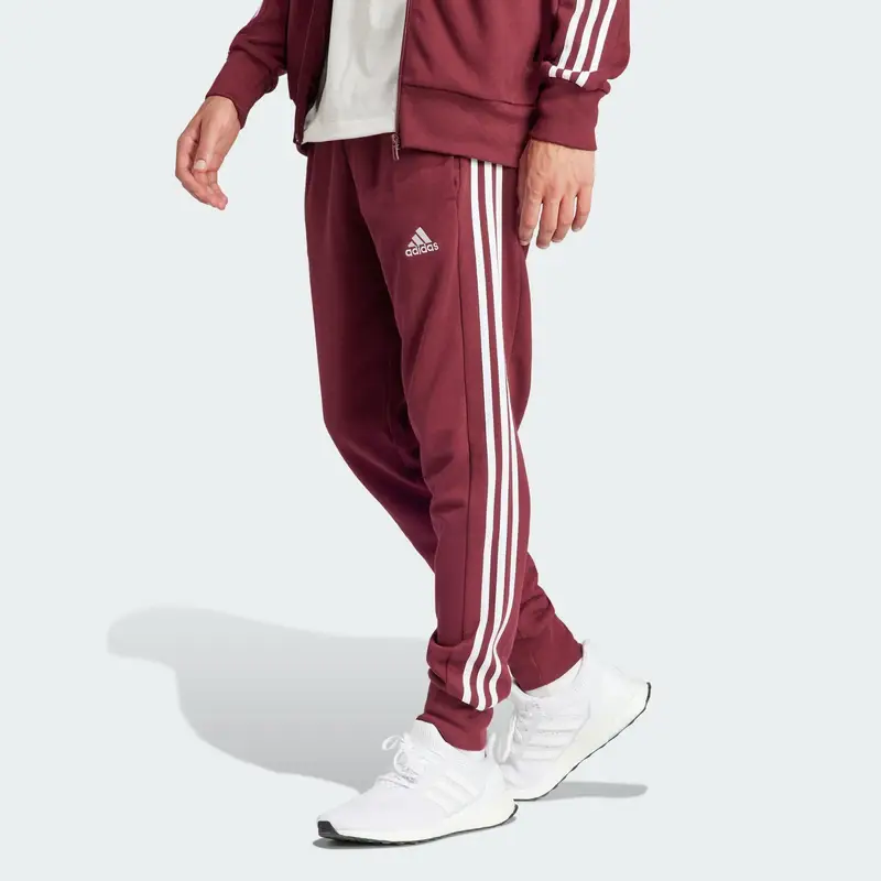 Pantaloni Essentials French Terry Tapered Cuff 3-Stripes | Adidas Rosso