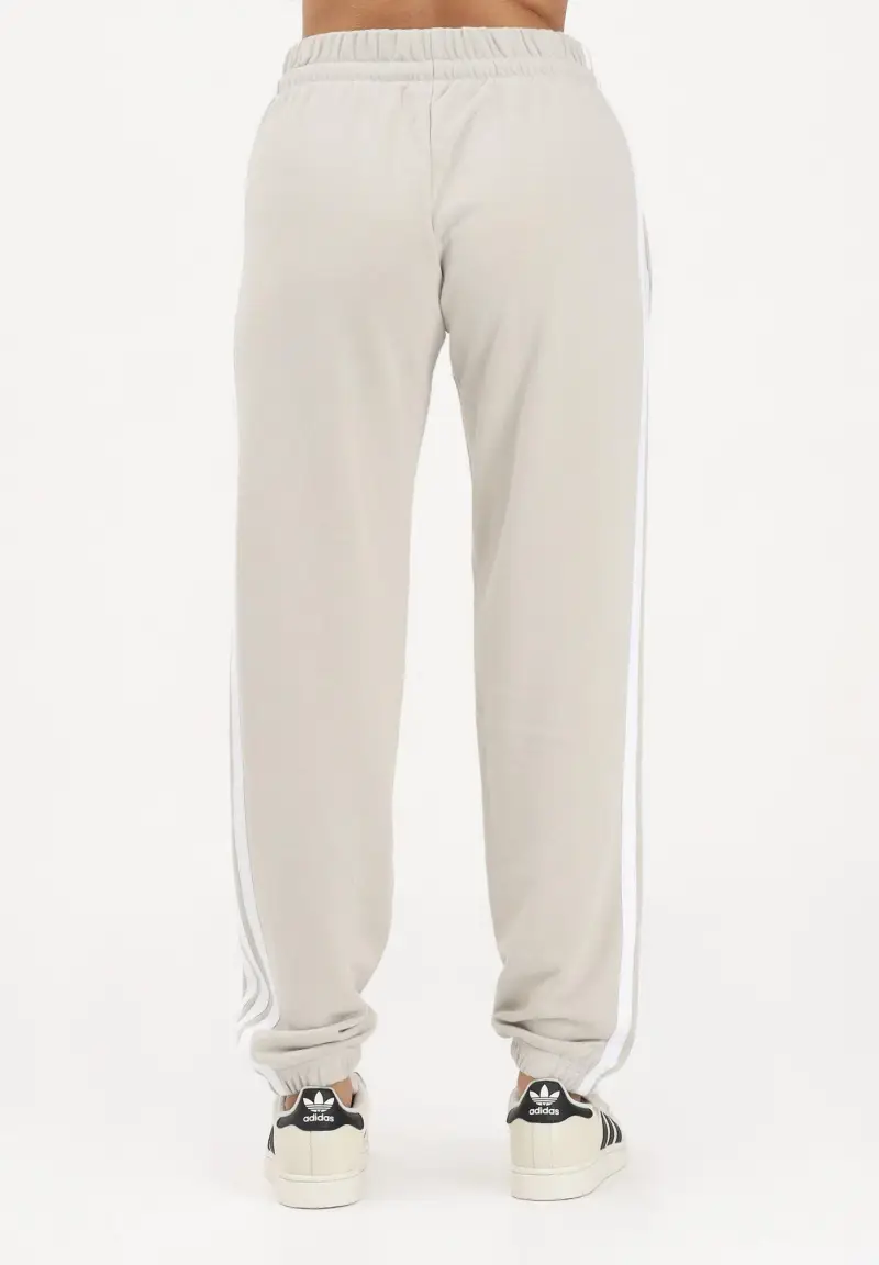 Pantalone sportivo Essentials 3-Stripes French Terry Cuffed beige da donna miniatura 3