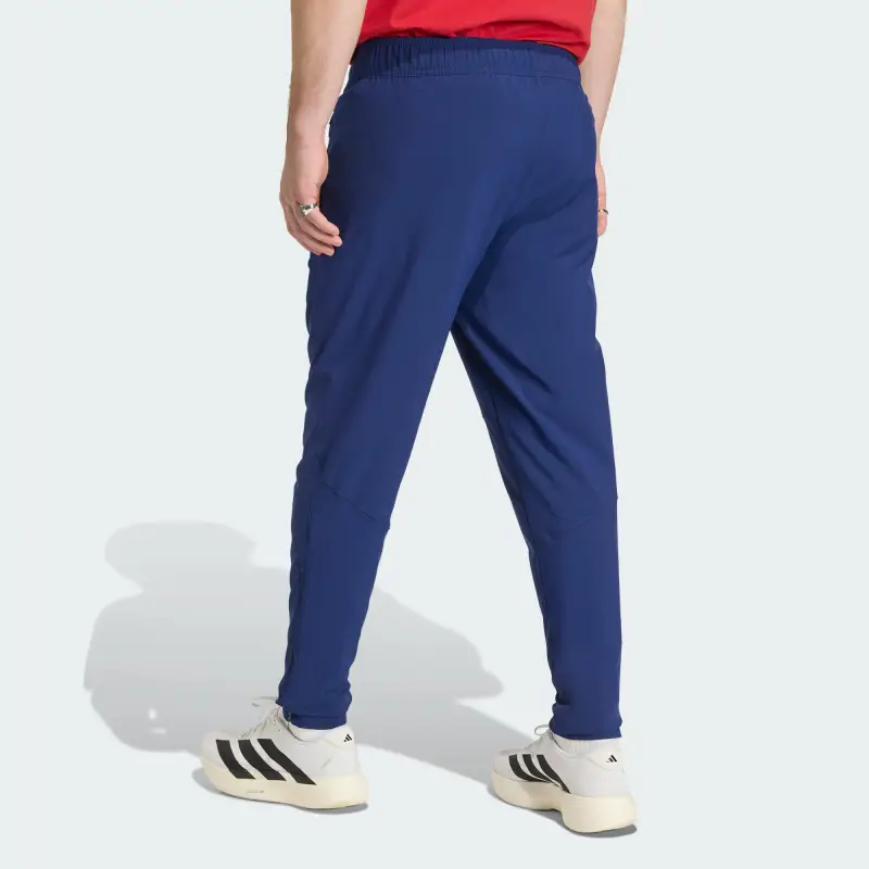 Pantaloni sportivi 'Spanien Tiro' blu scuro / zafferano miniatura 3