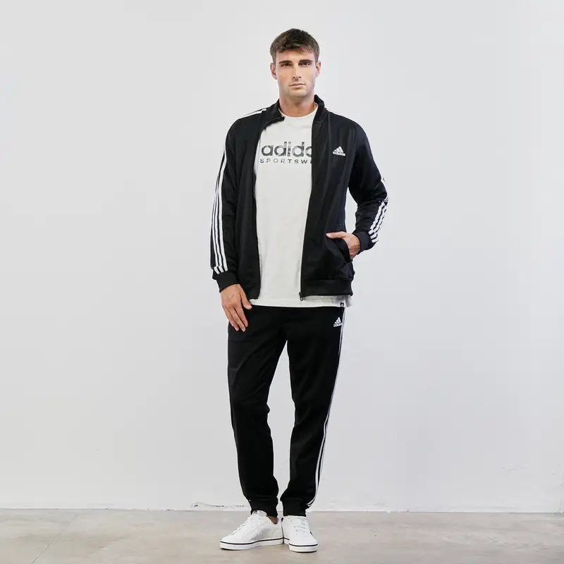 Tuta nera adidas con chiusura zip e tasche