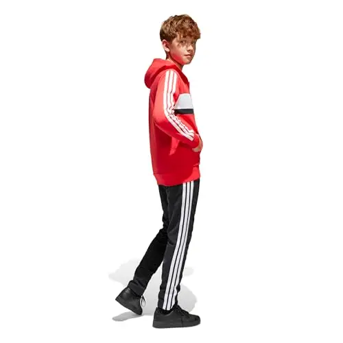 adidas Unisex - Bambini SEASONAL ESSENTIALS TIBERIO 3 STRIPES FLEECE TRACKSUIT, pure ruby/white, 7 miniatura 2