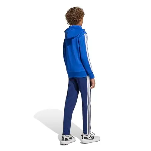 adidas Unisex - Bambini SEASONAL ESSENTIALS TIBERIO 3 STRIPES FLEECE TRACKSUIT, team royal blue/white/glow blue, 9 miniatura 2