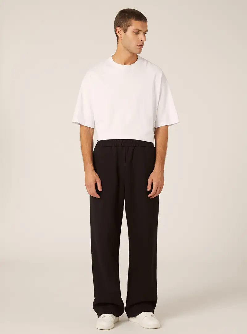 Pantaloni loose fit in felpa BK1 BLACK