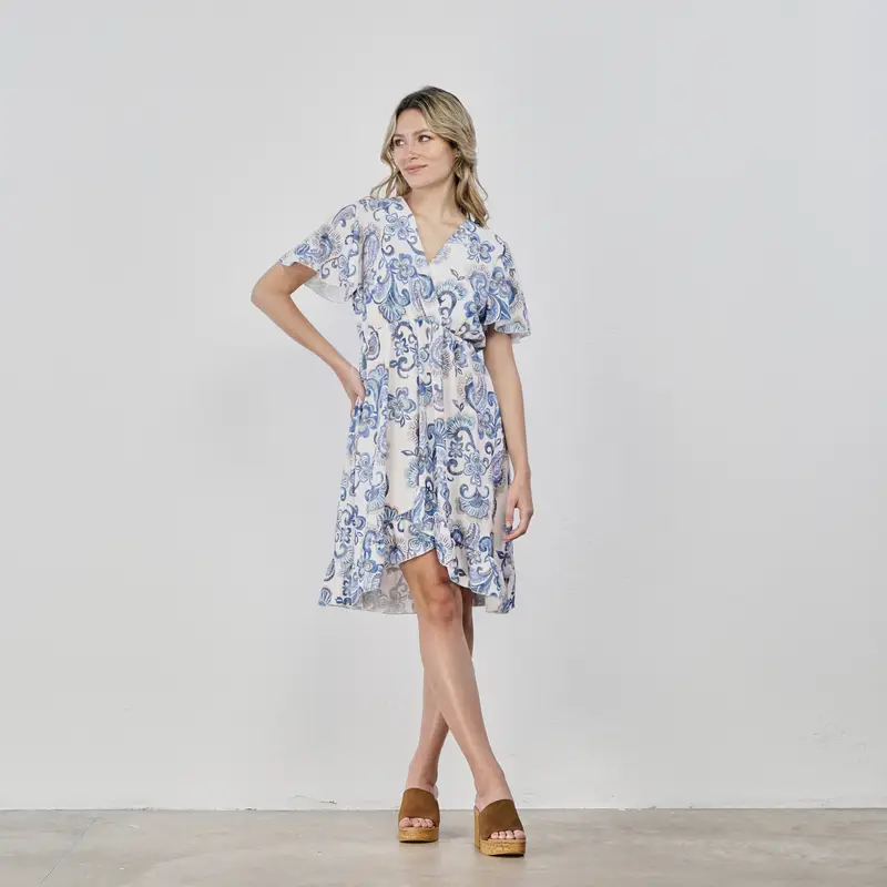 Abito corto bianco e azzurro con spacco