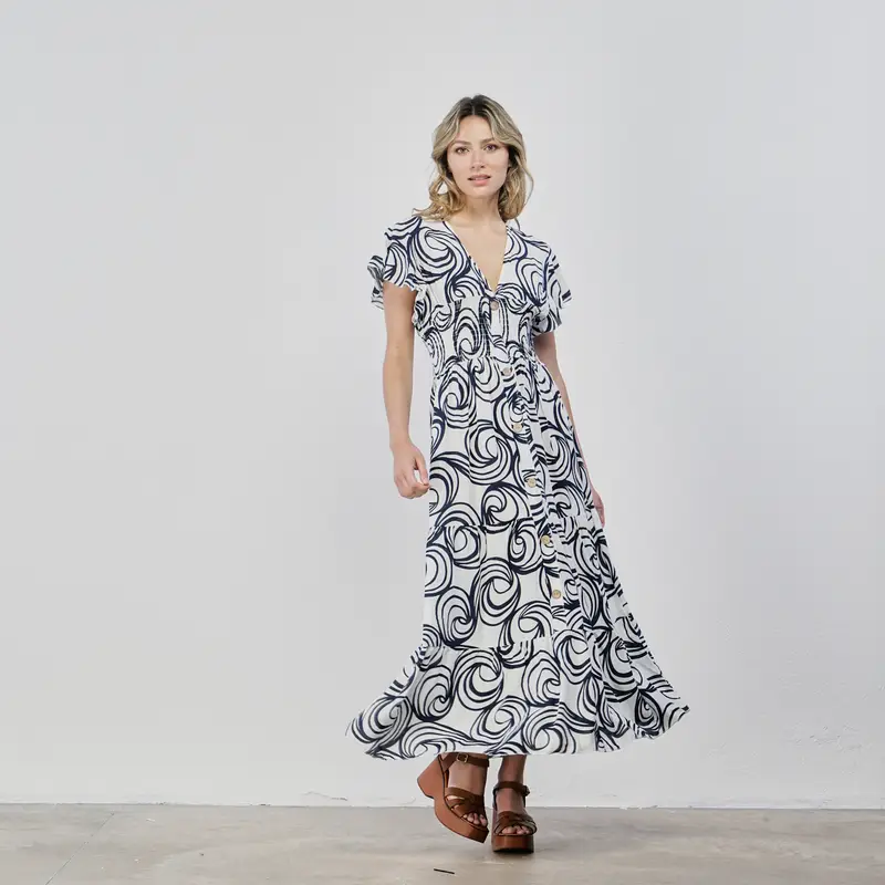 Abito lungo bianco con bottoni e stampa geometrica