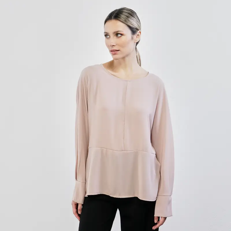 Blusa rosa ampia con scollo tondo