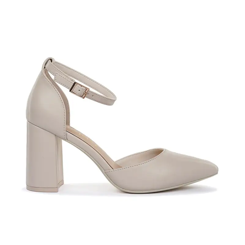 Decolletè rosa a punta con tacco alto largo e cinturino alla caviglia