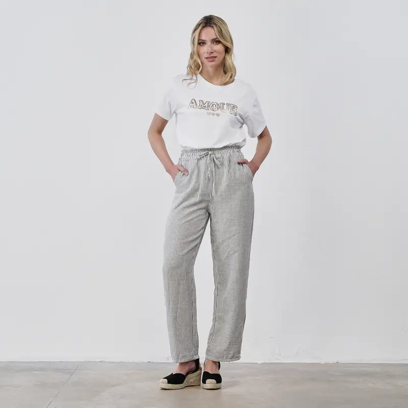 Pantaloni a righe bianchi e verdi da donna con tasche