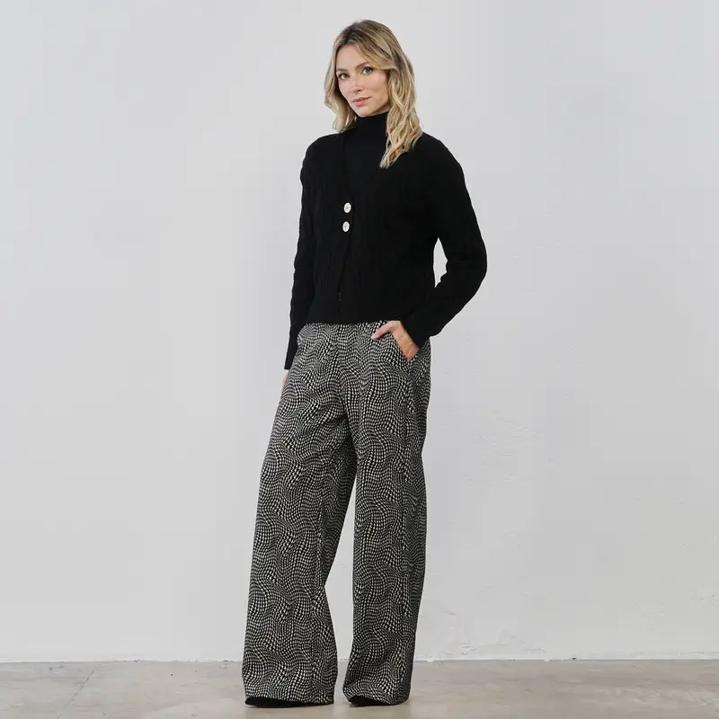 Pantaloni ampi lunghi neri e bianchi in fantasia geometrica