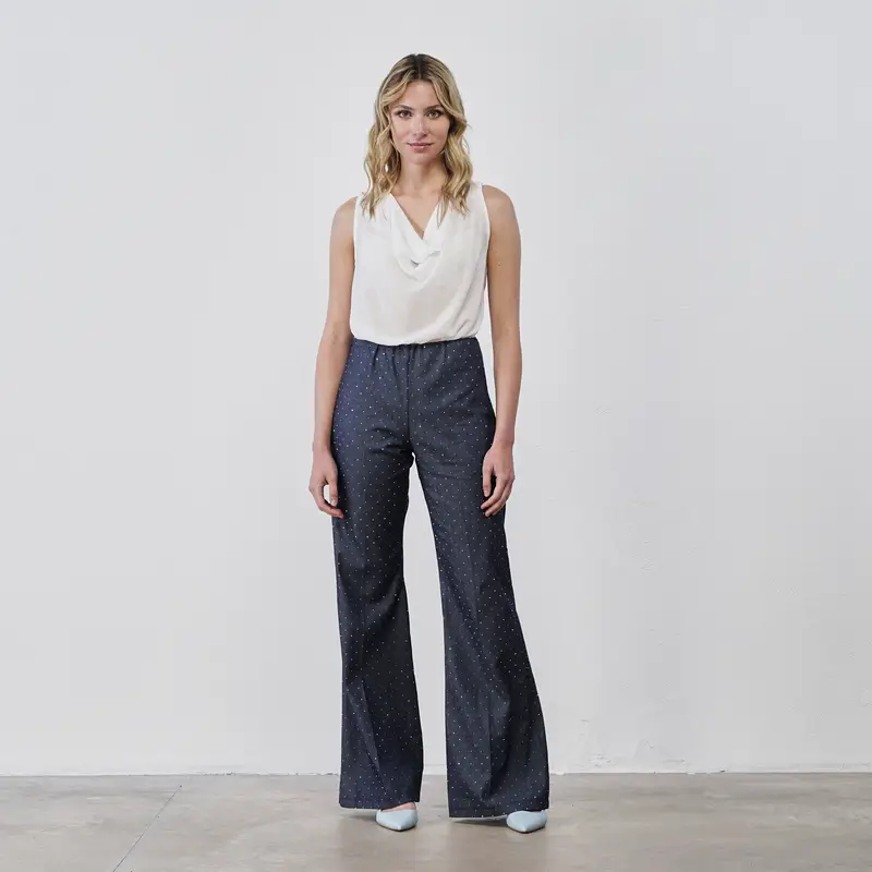 Pantaloni blu a zampa in denim da donna con strass