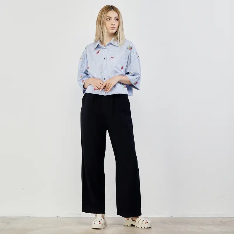 Pantaloni lunghi blu con fusciacca in vita