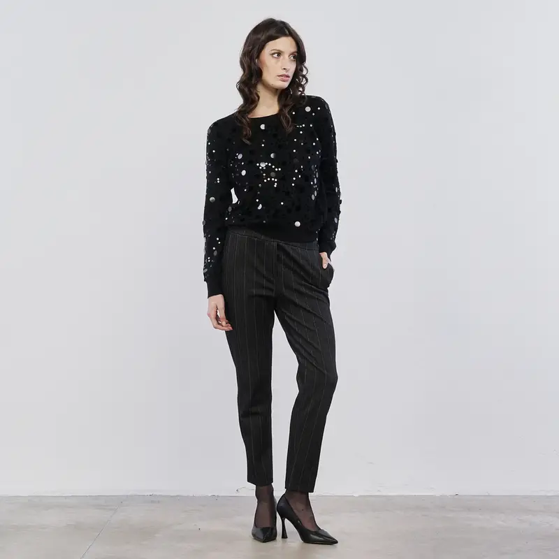 Pantaloni lunghi neri da donna in fantasia gessata