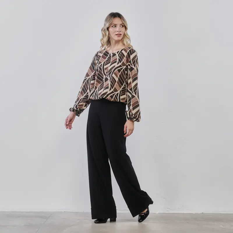 Pantaloni neri lunghi ampi da donna con maxi risvolto