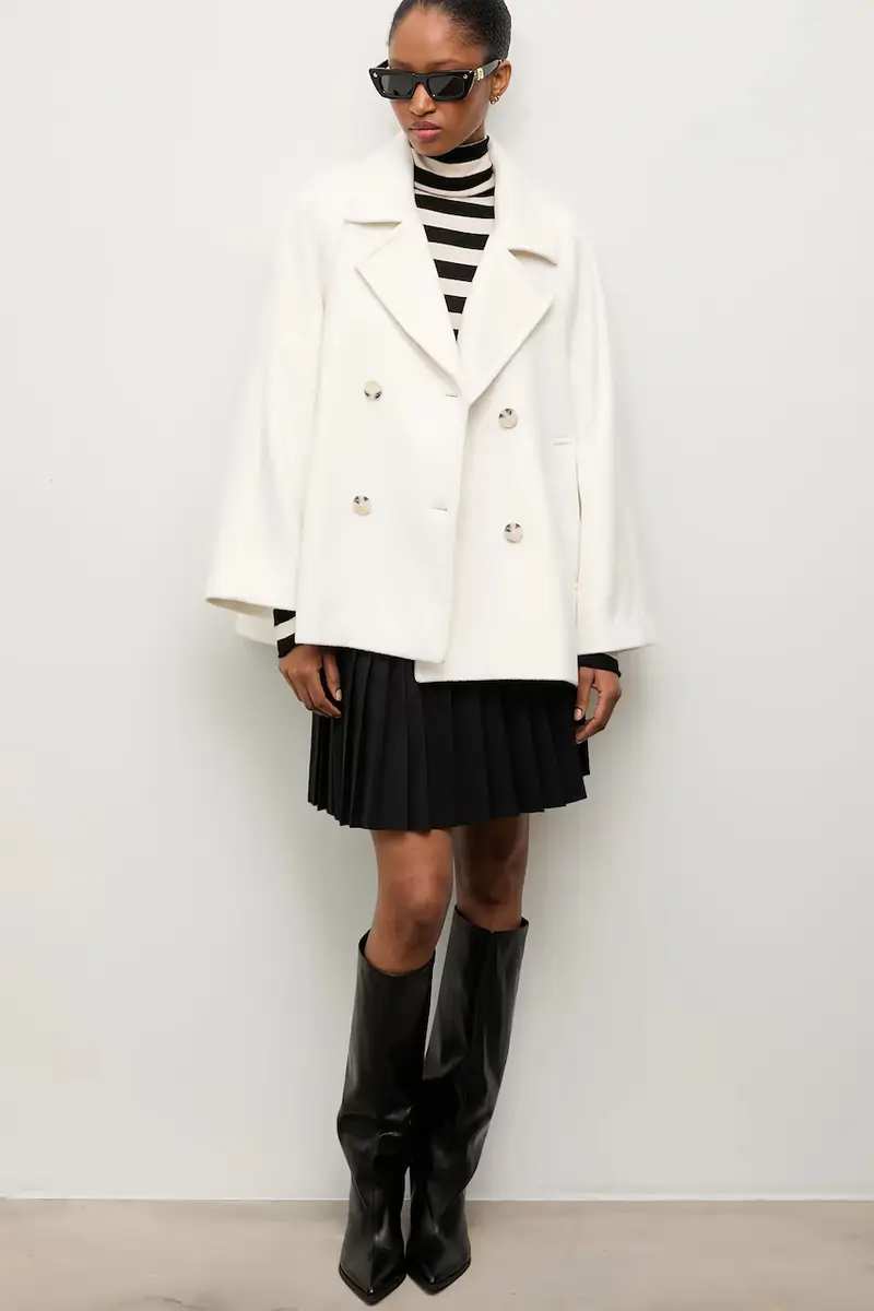 cappotto in lana colore bianco