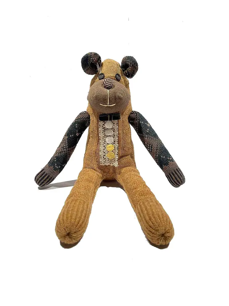 bambola lavorata a maglia Marrone