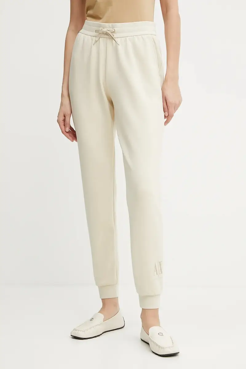 pantaloni tuta colore beige con applicazione XW000828 AF13397