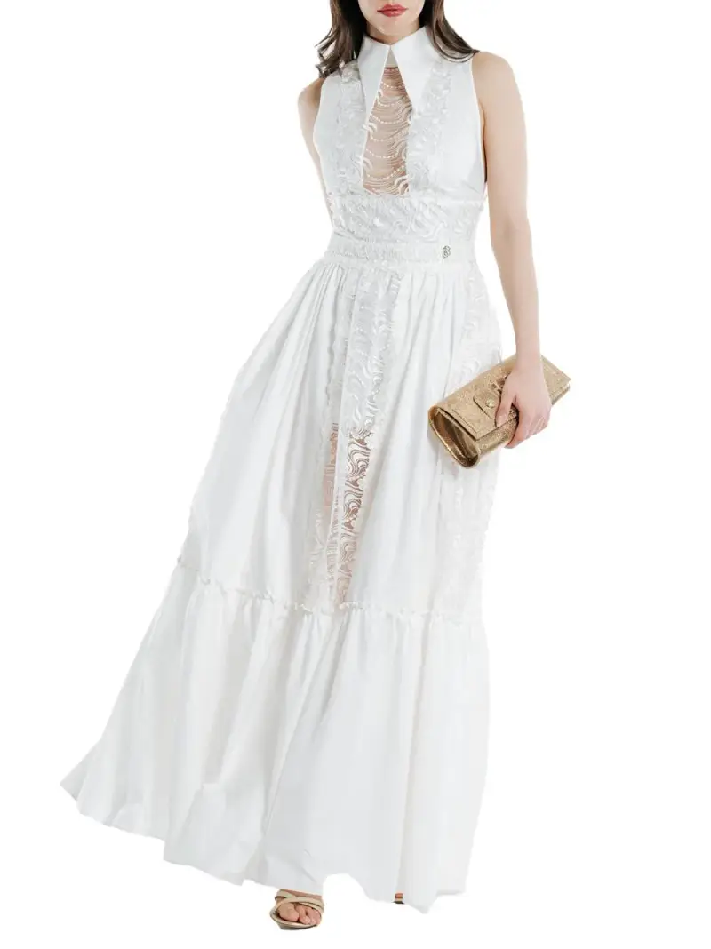Abito lungo bianco con semitrasparenze ricamate