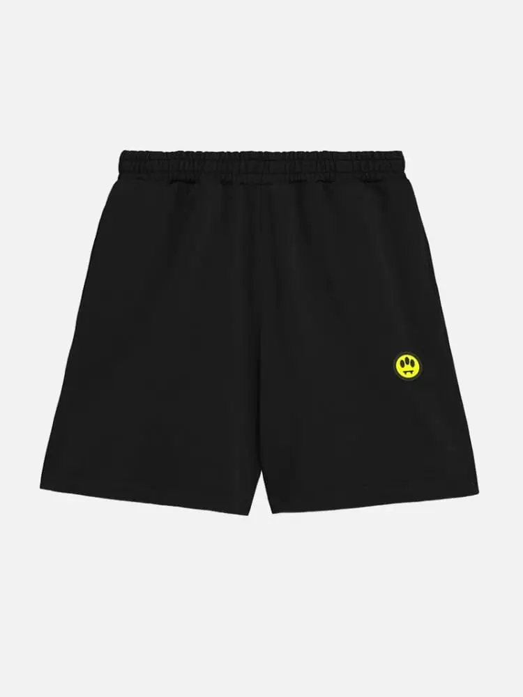 shorts in cotone nero con patch smile e stampa logo
