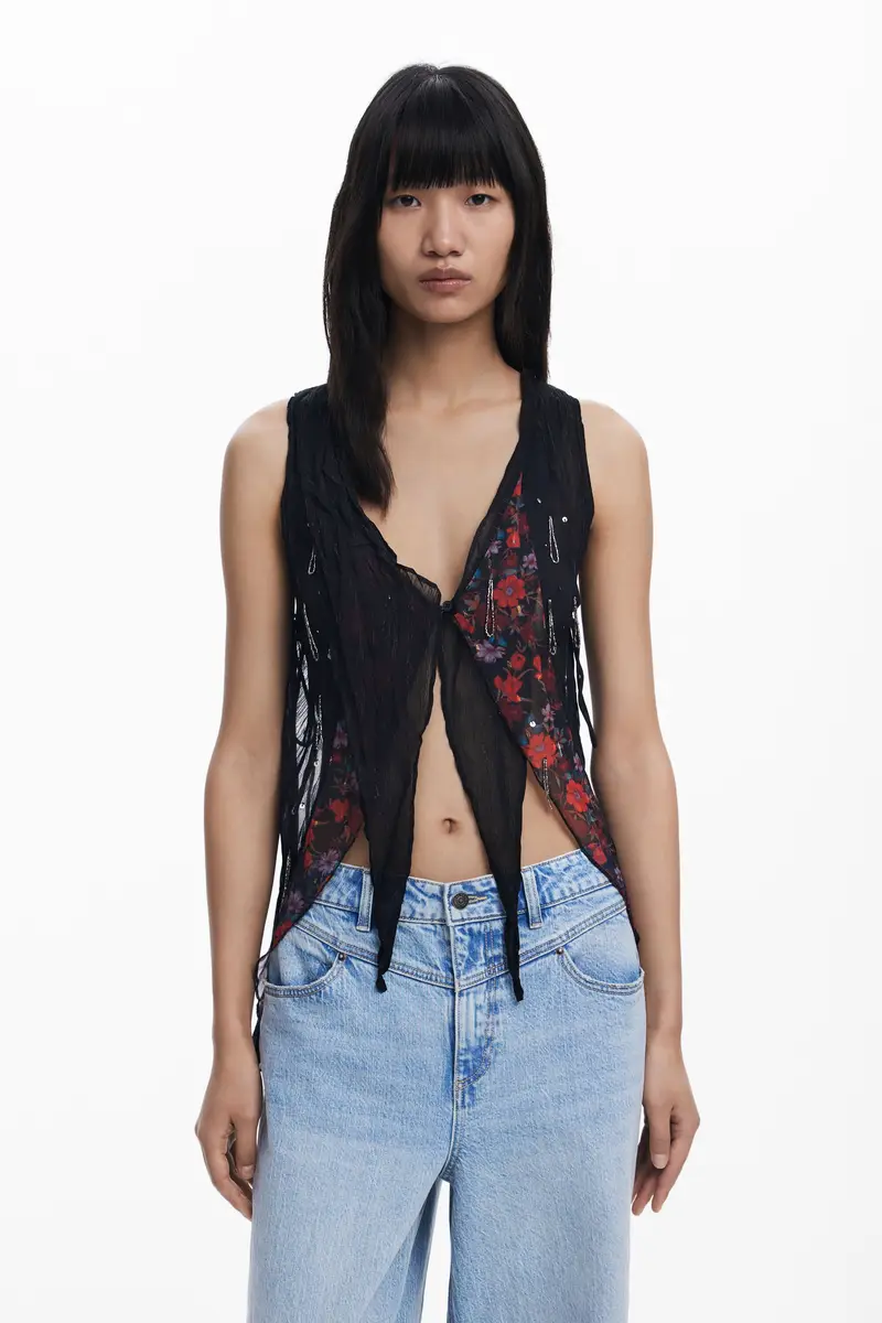 Blusa asimmetrica in chiffon