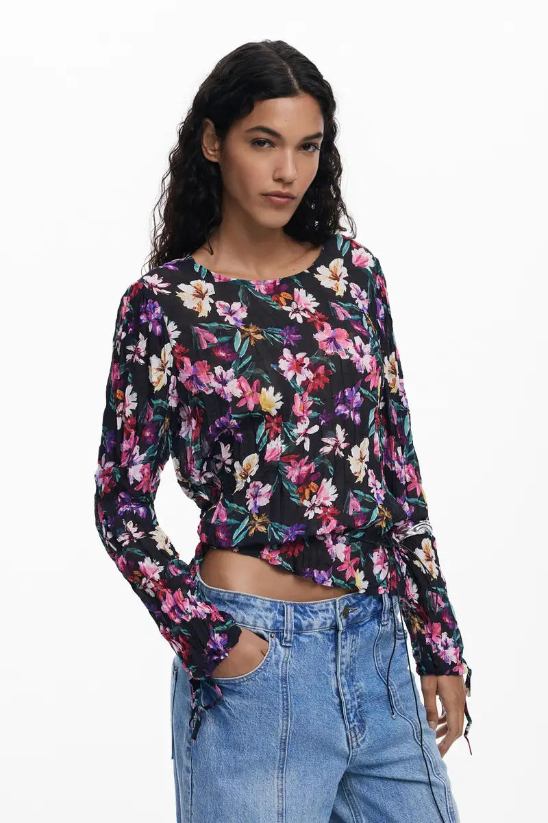 Blusa plissettata a fiori