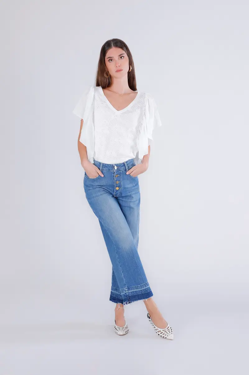 jeans cropped con orlo sciolto blu medio