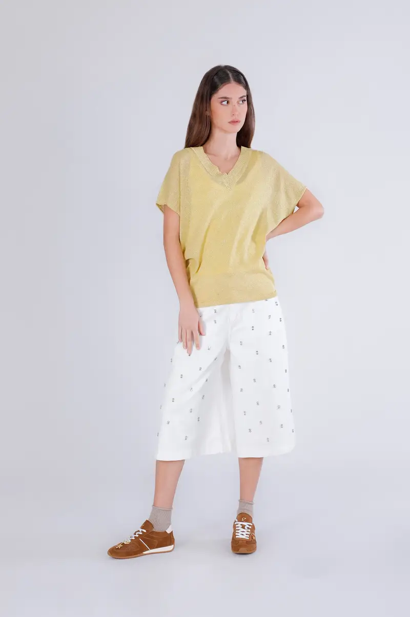 maglia da donna con maniche ad aletta in filato lurex giallo