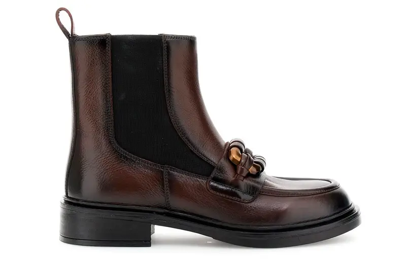 tronchetti in pelle con elastico e accessorio fasciato t moro