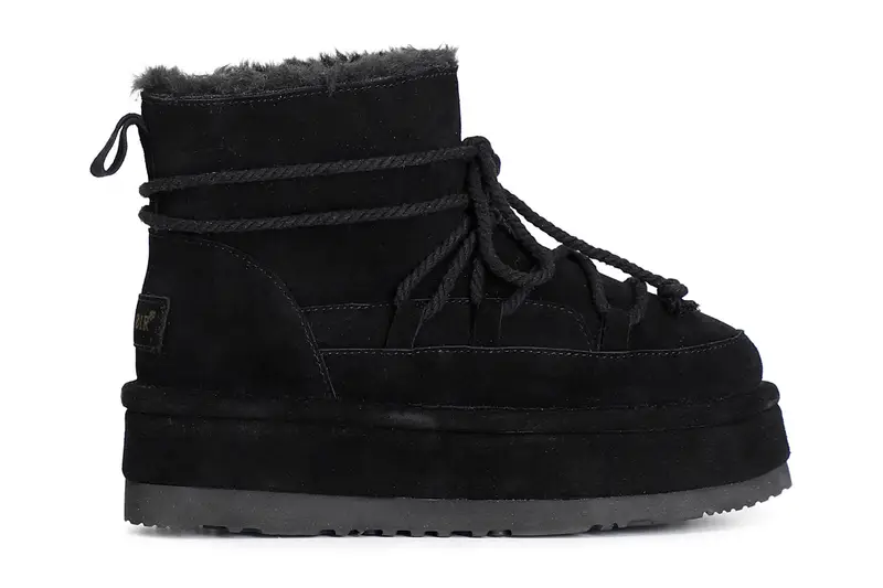 tronchetto da donna con pelliccia sintetica e allacciatura nero