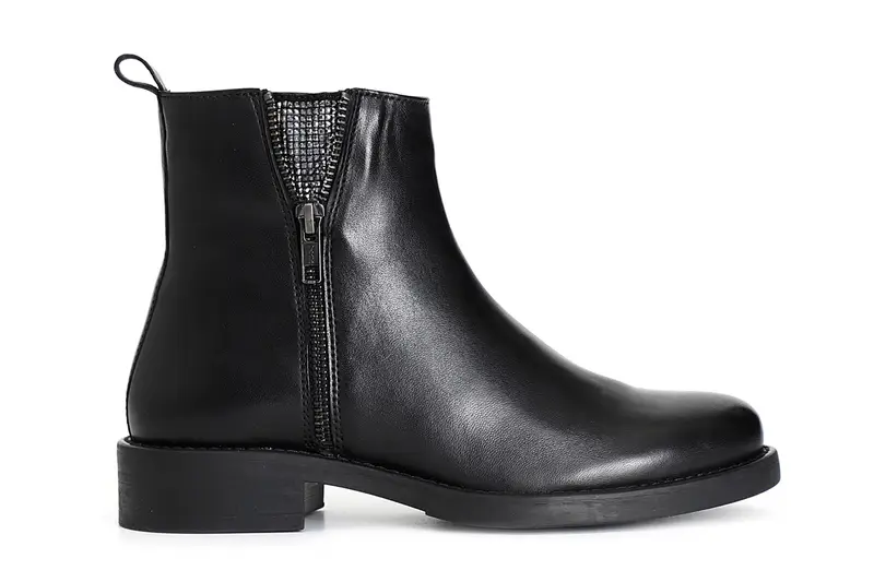 tronchetto da donna in pelle con zip e strass nero