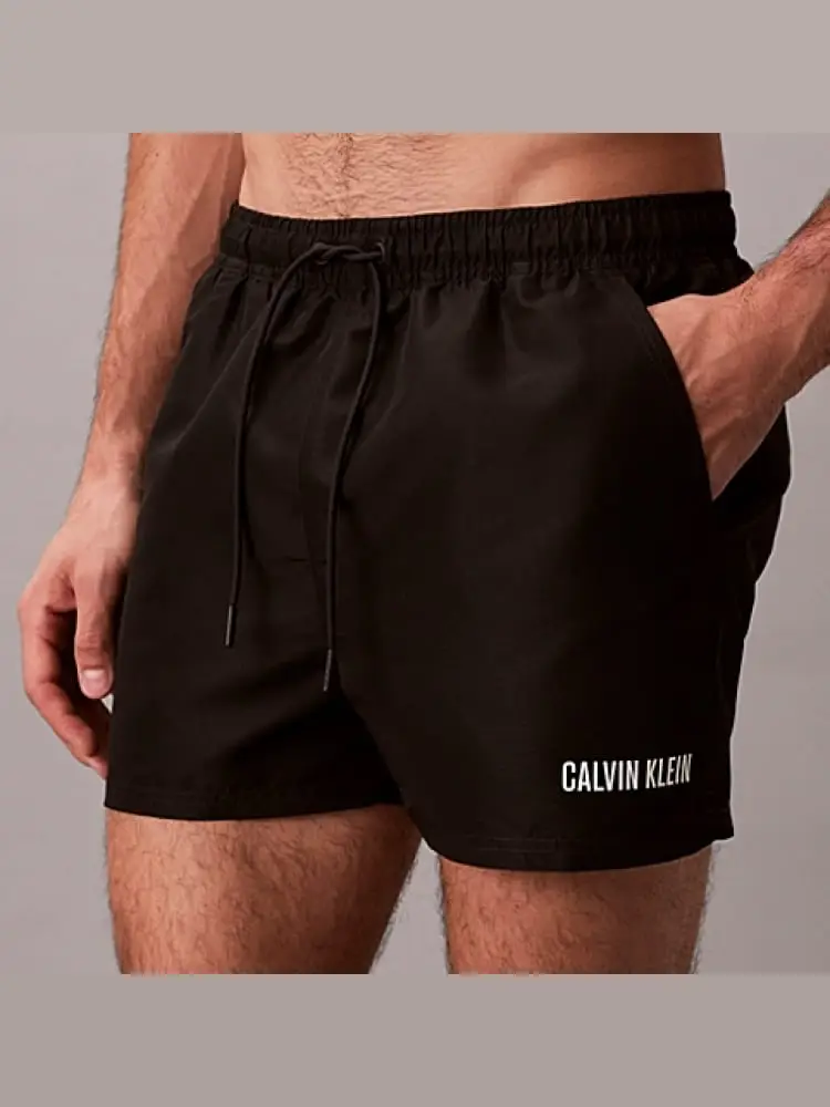 costume da bagno uomo nero con logo bianco laterale