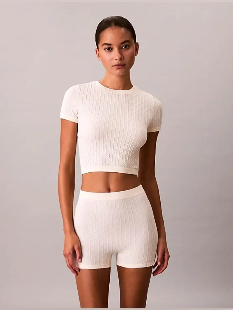 maglia pigiama bianca a costine con stemma