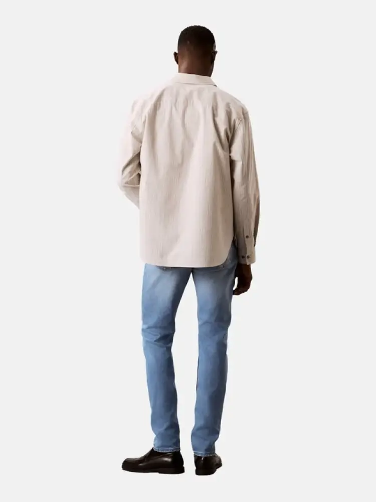 pantalone in denim chiaro uomo slim fit patch logo sul retro miniatura 2