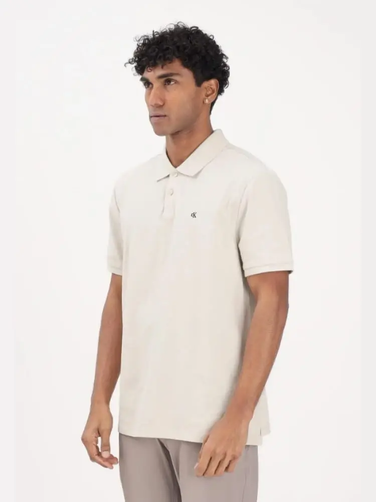 polo in piquet di cotone bianco con logo monogram
