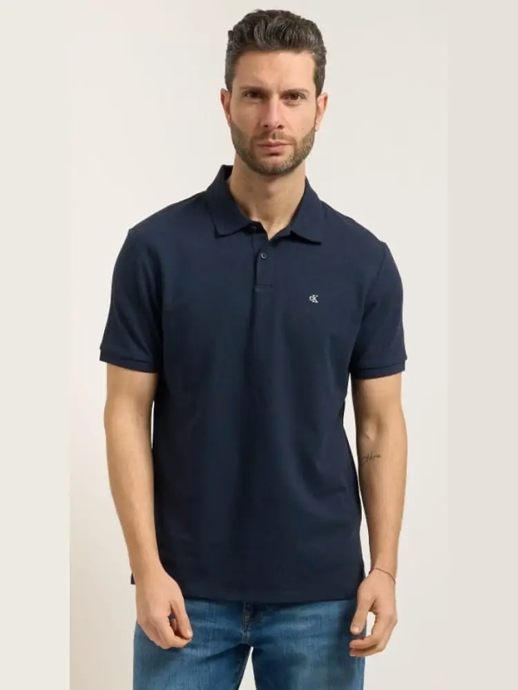 polo uomo in piquet blu e micro logo