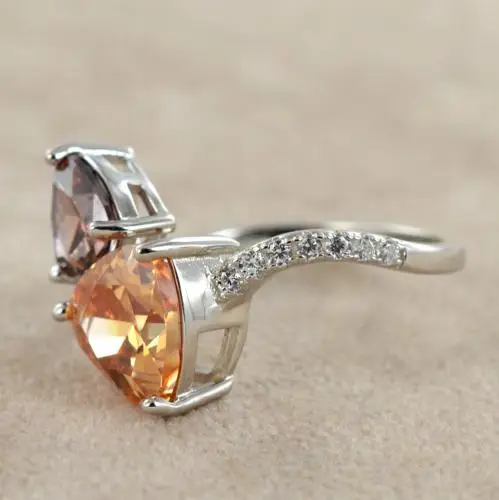 anello in argento contrarie con zirconi trillion miniatura 5